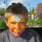 Boy with his face painted