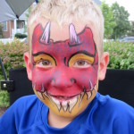 Boy with a dragon design at the Friday Night Concerts in South Riding