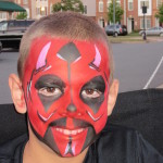 Boy with a Darth Maul inspired design at the Friday Night Concerts in South Riding