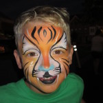 Boy with a tiger design at the Friday Night Concerts in South Riding