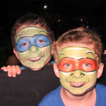 Two boys with ninja turtle design at the Friday Night Concerts in South Riding