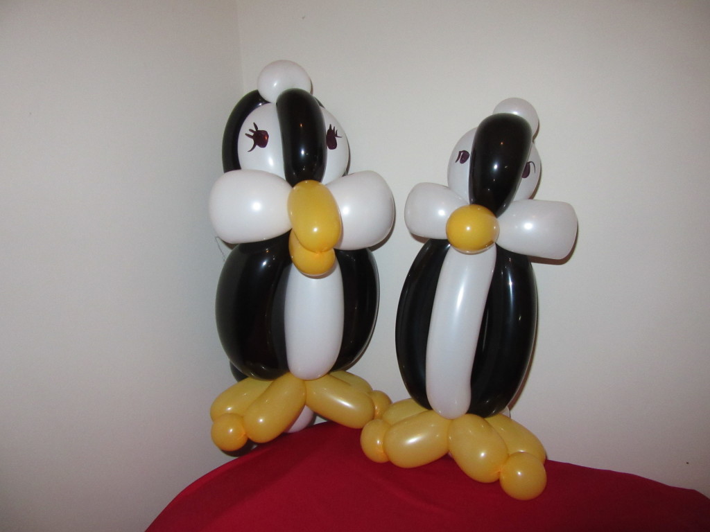 Two penguin balloons