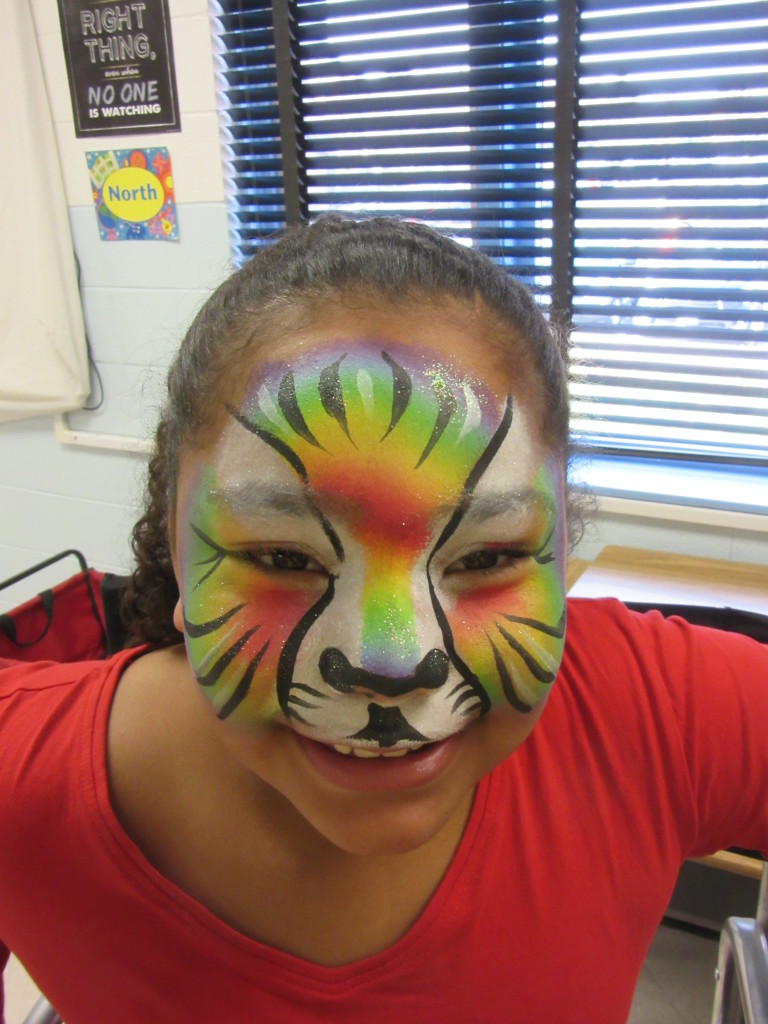 Rainbow tiger face painting